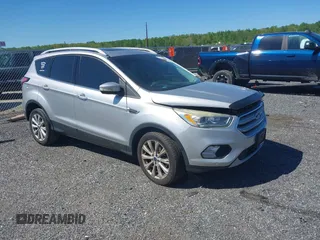 2018 Ford Escape Titanium with VIN 1FMCU9J96JUA33500, listed as a IAAI auction lot 42121736 with 105,430 mi miles and . Bid and sale history available at DreamBid. Image 1.