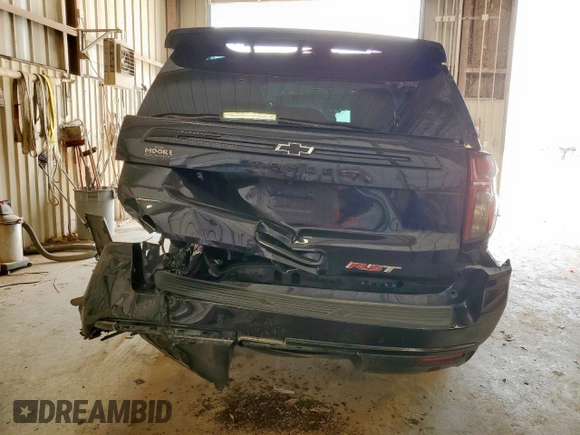 2023 Chevrolet Tahoe RST with VIN 1GNSCRKD5PR290351, listed as a Copart auction lot 58806595 with 64,909 mi miles and Salvage title. Bid and sale history available at DreamBid. Image 6.