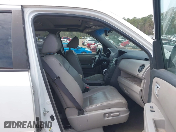 2011 Honda Pilot EX-L with VIN 5FNYF3H64BB027265, listed as a IAAI auction lot 41901424 with 198,556 mi miles and . Bid and sale history available at DreamBid. Image 5.