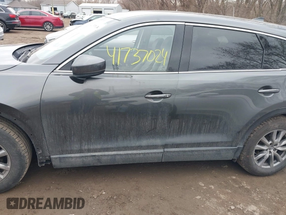 2018 Mazda CX-9 Touring with VIN JM3TCBCY3J0212479, listed as a IAAI auction lot 41737024 with 128,552 mi miles and . Bid and sale history available at DreamBid. Image 14.