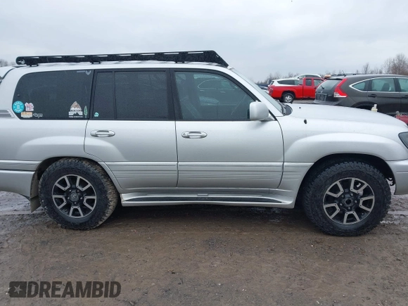 2006 Lexus LX 470 z VIN JTJHT00W364011426, wystawiony jako IAAI lot #42026869 z przebiegiem 254 659 mil mil oraz . Historia ofert i sprzedaży dostępna na DreamBid. Obrazek 13.