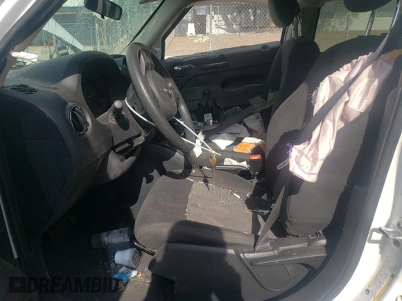 2014 Jeep Patriot Sport with VIN 1C4NJPBB9ED912846, listed as a Copart auction lot 58866985 with 191,195 mi miles and Salvage title. Bid and sale history available at DreamBid. Image 7.
