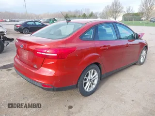2018 Ford Focus SE with VIN 1FADP3FE6JL318552, listed as a IAAI auction lot 42090857 with 81,624 mi miles. Bid and sale history available at carsss.com. Image 4.