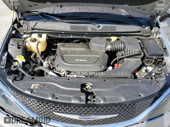 2017 Chrysler Pacifica Touring z VIN 2C4RC1DG4HR610934, wystawiony jako Copart lot #62421205 z przebiegiem 86 436 mil mil oraz Szkoda całkowita • Salvage title. Historia ofert i sprzedaży dostępna na DreamBid. Obrazek 12.