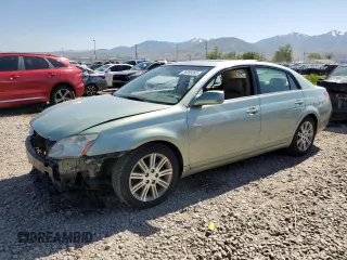 2005 Toyota Avalon XL z VIN 4T1BK36B15U052343, wystawiony jako Copart lot #56998895 z przebiegiem 209 280 mil mil oraz Szkoda całkowita • Salvage title. Historia ofert i sprzedaży dostępna na DreamBid. Obrazek 1.