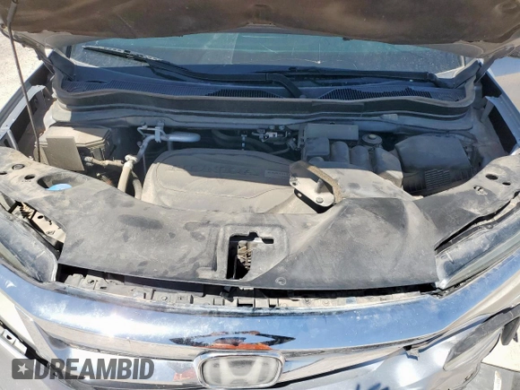 2019 Honda Pilot Elite with VIN 5FNYF6H09KB057259, listed as a Copart auction lot 56770835 with 74,492 mi miles and Salvage title. Bid and sale history available at DreamBid. Image 12.