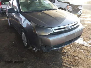 2011 Ford Focus S with VIN 1FAHP3EN7BW167384, listed as a IAAI auction lot 41687933 with 153,124 mi miles. Bid and sale history available at carsss.com. Image 6.