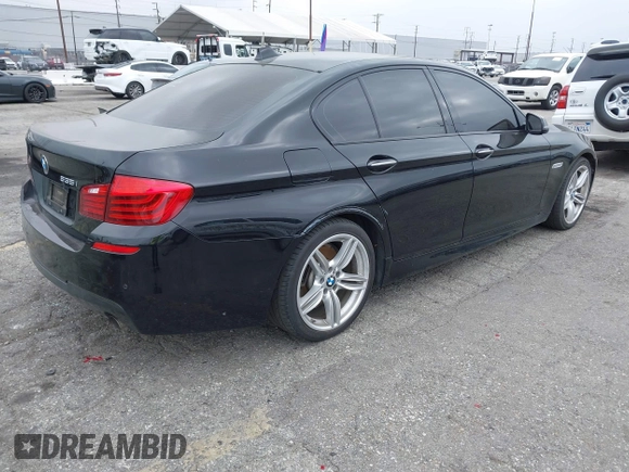 2015 BMW 5 Series 535i with VIN WBA5B1C55FG128387, listed as a IAAI auction lot 41885806 with 94,734 mi miles and . Bid and sale history available at carsss.com. Image 4.
