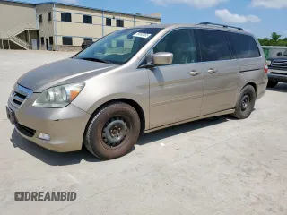 2006 Honda Odyssey Touring z VIN 5FNRL38866B025148, wystawiony jako Copart lot #59893365 z przebiegiem 161 280 mil mil oraz Czysty tytuł • Clean title. Historia ofert i sprzedaży dostępna na DreamBid. Obrazek 1.