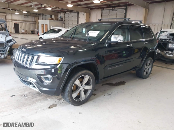 2014 Jeep Grand Cherokee Overland with VIN 1C4RJFCM4EC386398, listed as a IAAI auction lot 41696113 with 119,110 mi miles. Bid and sale history available at carsss.com. Image 17.