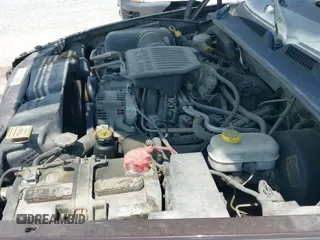 2004 Dodge Dakota SLT with VIN 1D7HG48N34S693877, listed as a IAAI auction lot 42423197 with 163,141 mi miles and . Bid and sale history available at DreamBid. Image 14.