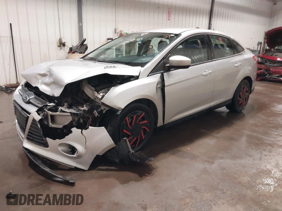 2012 Ford Focus SE with VIN 1FAHP3F21CL284921, listed as a IAAI auction lot 42054351 with 164,377 mi miles and . Bid and sale history available at carsss.com. Image 17.