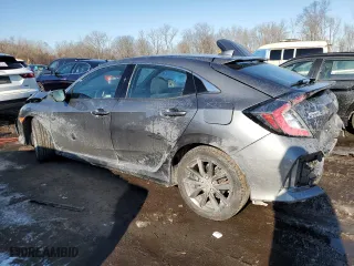 2021 Honda Civic Hatchback EX with VIN SHHFK7H65MU424463, listed as a Copart auction lot 42586355 with 32,238 mi miles and Salvage Title. Bid and sale history available at carsss.com. Image 2.