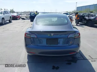 2020 Tesla Model 3 Standard Range Plus z VIN 5YJ3E1EA6LF703159, wystawiony jako IAAI lot #42099718 z przebiegiem 30 175 mil mil oraz . Historia ofert i sprzedaży dostępna na DreamBid. Obrazek 16.