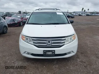 2013 Honda Odyssey Touring with VIN 5FNRL5H99DB041328, listed as a IAAI auction lot 41797520 with 148,523 mi miles and . Bid and sale history available at carsss.com. Image 12.