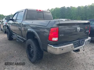 2017 Ram 2500 SLT with VIN 3C6UR5DL9HG561899, listed as a IAAI auction lot 42071797 with 134,808 mi miles and . Bid and sale history available at DreamBid. Image 3.
