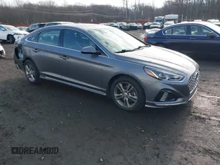 2019 Hyundai Sonata Sport z VIN 5NPE34AF3KH820828, wystawiony jako IAAI lot #41015372 z przebiegiem 32 782 mil mil oraz . Historia ofert i sprzedaży dostępna na DreamBid. Obrazek 1.