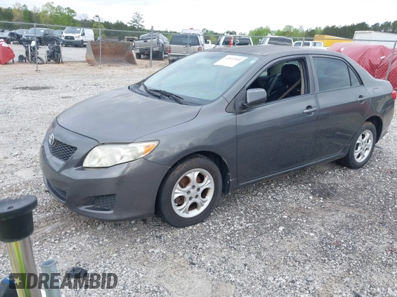 2009 Toyota Corolla with VIN JTDBL40E399032176, listed as a IAAI auction lot 42035968 with 213,062 mi miles. Bid and sale history available at carsss.com. Image 2.