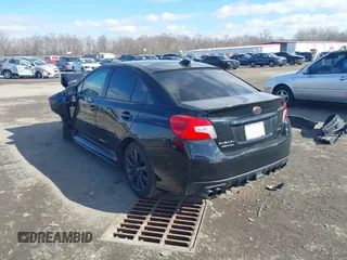 2015 Subaru WRX Premium with VIN JF1VA1D61F9823988, listed as a IAAI auction lot 41642433 with 27,517 mi miles. Bid and sale history available at carsss.com. Image 3.
