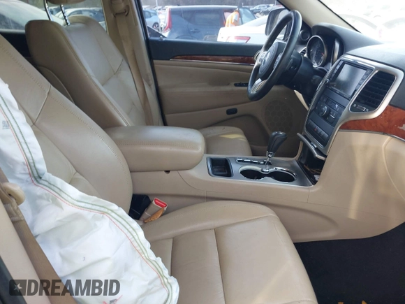 2013 Jeep Grand Cherokee Limited with VIN 1C4RJEBGXDC520609, listed as a IAAI auction lot 41493503 with 173,020 mi miles. Bid and sale history available at carsss.com. Image 5.
