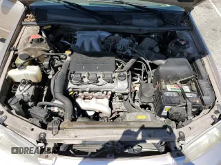 1999 Toyota Camry LE z VIN JT2BF22KXX0230830, wystawiony jako Copart lot #52253985 z przebiegiem 151 758 mil mil oraz Szkoda całkowita • Salvage title. Historia ofert i sprzedaży dostępna na DreamBid. Obrazek 11.