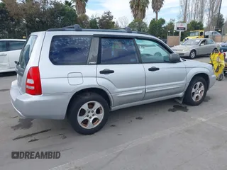 2003 Subaru Forester XS with VIN JF1SG65633H714866, listed as a IAAI auction lot 41697132 with 162,447 mi miles. Bid and sale history available at carsss.com. Image 4.