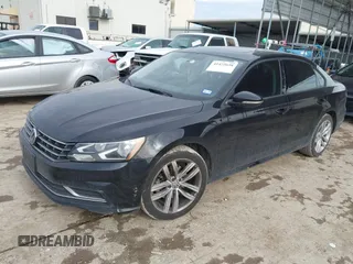 2019 Volkswagen Passat 2.0T Wolfsburg Edition with VIN 1VWLA7A31KC008439, listed as a IAAI auction lot 41472658 with 105,164 mi miles. Bid and sale history available at carsss.com. Image 2.