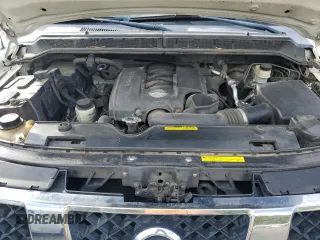 2006 Nissan Titan LE z VIN 1N6AA07B66N556878, wystawiony jako Copart lot #47880935 z przebiegiem 221 371 mil mil oraz Szkoda całkowita • Salvage title. Historia ofert i sprzedaży dostępna na DreamBid. Obrazek 11.