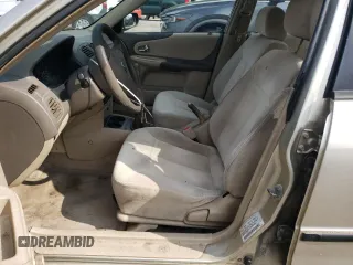 2003 Mazda Protege DX with VIN JM1BJ225X30107443, listed as a Copart auction lot 54777625 with 283,760 mi miles and Clean Title. Bid and sale history available at DreamBid. Image 7.