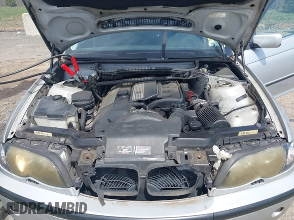 2003 BMW 3 Series 330i with VIN WBAEV53463KM25215, listed as a IAAI auction lot 42048348 with 107,271 mi miles. Bid and sale history available at carsss.com. Image 10.