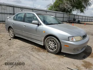 1999 Infiniti G20 z VIN JNKCP11A8XT015021, wystawiony jako Copart lot #67966844 z przebiegiem 268 922 mil mil oraz Szkody całkowita. Historia ofert i sprzedaży dostępna na DreamBid. Obrazek 4.
