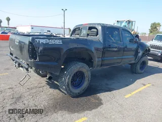 2006 Toyota Tacoma with VIN 5TEMU52NX6Z193763, listed as a IAAI auction lot 42760890 with 232,694 mi miles and . Bid and sale history available at DreamBid. Image 4.