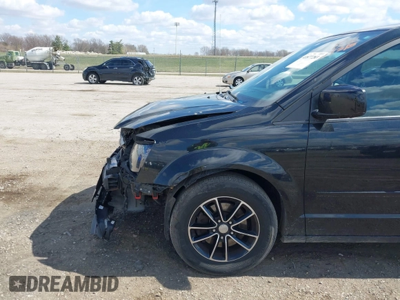 2017 Dodge Grand Caravan SXT with VIN 2C4RDGCG8HR756271, listed as a IAAI auction lot 41877283 with 136,598 mi miles and . Bid and sale history available at DreamBid. Image 6.