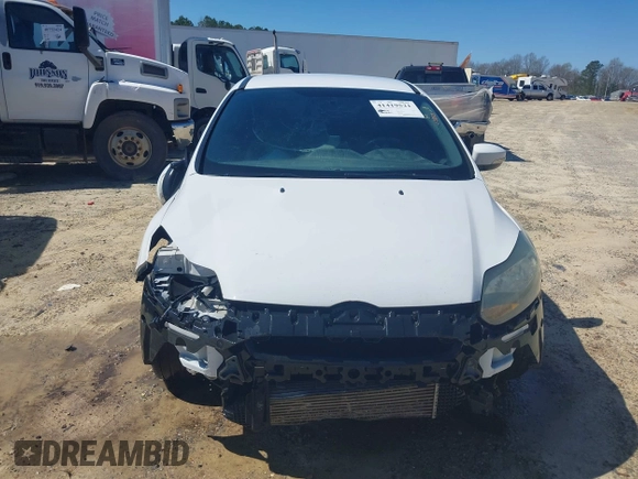 2014 Ford Focus ST with VIN 1FADP3L99EL311771, listed as a IAAI auction lot 41419521 with 124,572 mi miles and . Bid and sale history available at carsss.com. Image 13.