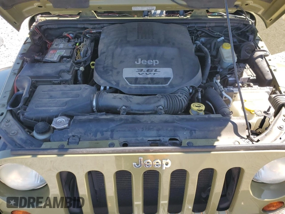 2013 Jeep Wrangler Unlimited Rubicon with VIN 1C4BJWFG0DL587057, listed as a Copart auction lot 57362535 with 102,684 mi miles and Salvage title. Bid and sale history available at DreamBid. Image 12.