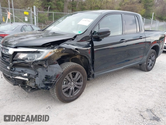 2019 Honda Ridgeline Sport with VIN 5FPYK3F10KB046552, listed as a IAAI auction lot 41983384 with 77,229 mi miles and . Bid and sale history available at DreamBid. Image 2.