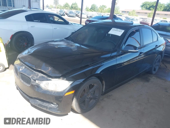 2013 BMW 3 Series 328i with VIN WBA3C1C55DF437400, listed as a IAAI auction lot 42095263 with Not Provided miles and . Bid and sale history available at carsss.com. Image 2.