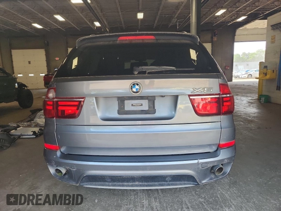 2012 BMW X5 35i z VIN 5UXZV4C58CL758466, wystawiony jako Copart lot #59799955 z przebiegiem 119 331 mil mil oraz Nie do naprawy • Non repairable. Historia ofert i sprzedaży dostępna na DreamBid. Obrazek 6.