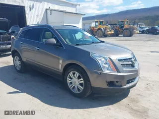 2012 Cadillac SRX Luxury Collection with VIN 3GYFNDE36CS542006, listed as a IAAI auction lot 41976675 with 137,418 mi miles. Bid and sale history available at carsss.com. Image 1.