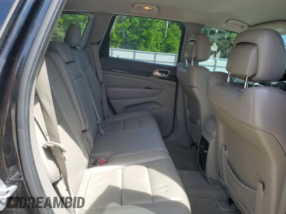 2013 Jeep Grand Cherokee Laredo with VIN 1C4RJEAG2DC519570, listed as a Copart auction lot 52066225 with 129,091 mi miles and Salvage Title. Bid and sale history available at carsss.com. Image 11.