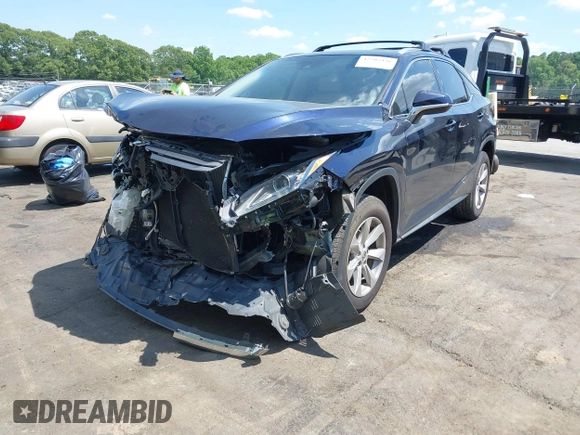2016 Lexus RX 350 with VIN JTJBZMCA2G2001429, listed as a IAAI auction lot 42202436 with Not provided miles and . Bid and sale history available at DreamBid. Image 17.