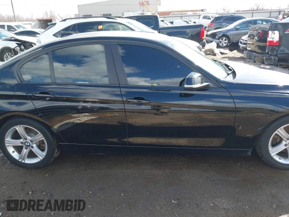 2015 BMW 3 Series 328i xDrive with VIN WBA3B5G56FNS20581, listed as a IAAI auction lot 41692014 with 196,609 mi miles. Bid and sale history available at carsss.com. Image 13.