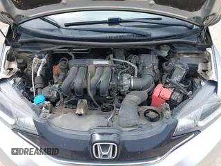 2015 Honda Fit EX-L z VIN 3HGGK5H8XFM730425, wystawiony jako IAAI lot #42503809 z przebiegiem 105 469 mil mil oraz . Historia ofert i sprzedaży dostępna na DreamBid. Obrazek 10.