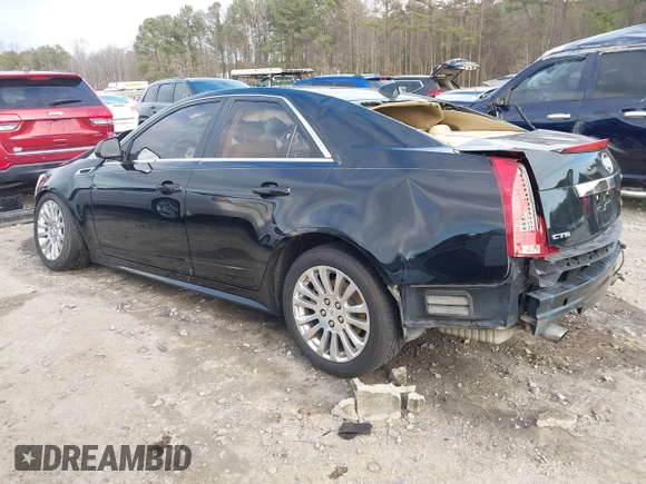 2011 Cadillac CTS Premium with VIN 1G6DP5ED2B0171652, listed as a IAAI auction lot 41229368 with 162,064 mi miles and . Bid and sale history available at DreamBid. Image 3.