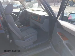 2007 Jeep Commander Sport z VIN 1J8HG48K97C566185, wystawiony jako IAAI lot #41519140 z przebiegiem 127 230 mil mil oraz . Historia ofert i sprzedaży dostępna na DreamBid. Obrazek 5.