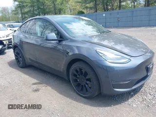 2020 Tesla Model Y Long Range with VIN 5YJYGDEE2LF029385, listed as a IAAI auction lot 42164786 with 58,685 mi miles and . Bid and sale history available at DreamBid. Image 1.