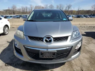 2012 Mazda CX-7 i SV z VIN JM3ER2AM2C0412683, wystawiony jako Copart lot #53774075 z przebiegiem 196 344 mil mil oraz Czysty tytuł • Clean title. Historia ofert i sprzedaży dostępna na DreamBid. Obrazek 5.
