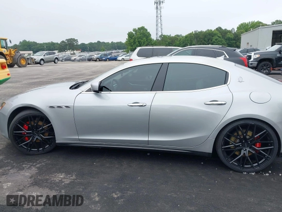 2015 Maserati Ghibli S Q4 with VIN ZAM57RTA2F1146411, listed as a IAAI auction lot 42359547 with 95,937 mi miles and . Bid and sale history available at DreamBid. Image 14.