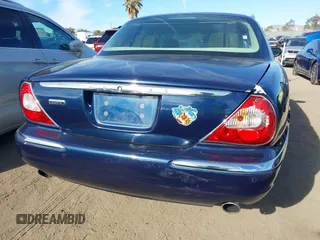 2006 Jaguar XJ with VIN SAJWA79B76SG50210, listed as a IAAI auction lot 41252871 with 66,543 mi miles. Bid and sale history available at carsss.com. Image 6.
