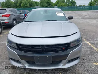 2015 Dodge Charger SXT with VIN 2C3CDXHG1FH886088, listed as a IAAI auction lot 42331369 with 119,659 mi miles and . Bid and sale history available at DreamBid. Image 12.